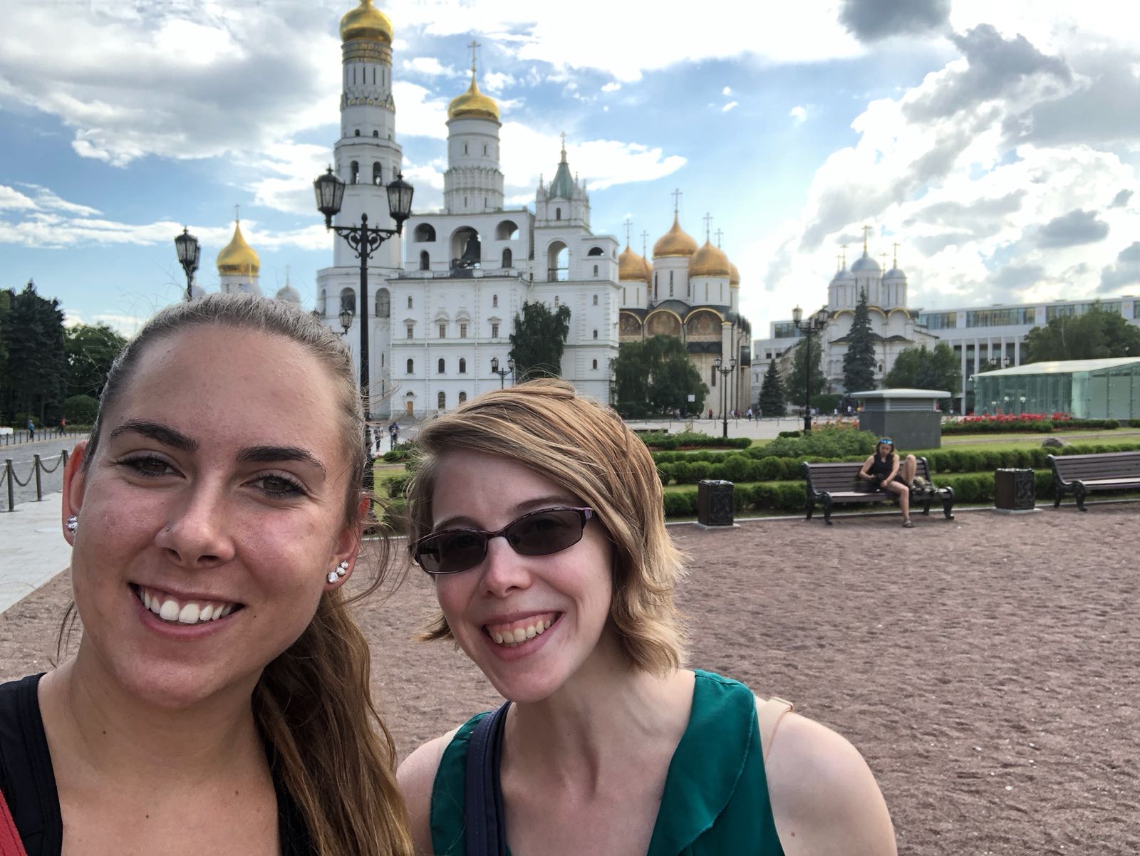 Ms. Williams and one of her younger peers, smiling in front of a cathedral in Russia